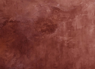 red cracked stone wall background close up