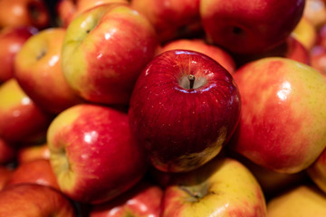 Fototapeta na wymiar Apples background. Beautiful red fruits. Healthy foods for immunity.