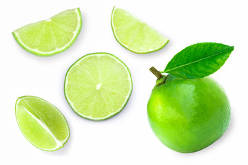 Close up fresh whole Lime fruits with green leaf and slice isolated on white background. Top view.