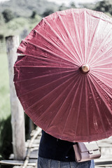 woman with red umbrella