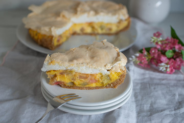Home made rhubarb meringue cake on a plate