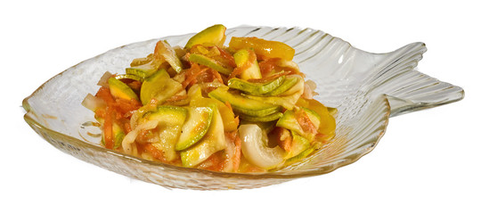 Salad of zucchini carrot pepper, isolated on a white background. Clipping path.