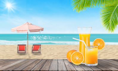 Summer Vacation Concept : Welcome drink orange juice punch put on wooden table with blurry blue water and seascape view in background.