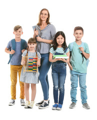 Little pupils with math teacher on white background