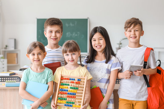 Children During Math Lesson In Classroom