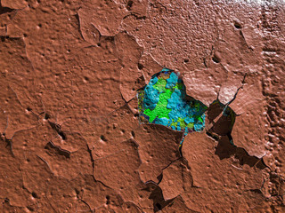Planet earth from texture of old dirty  cracked broun wall. Abstract background in grunge style....