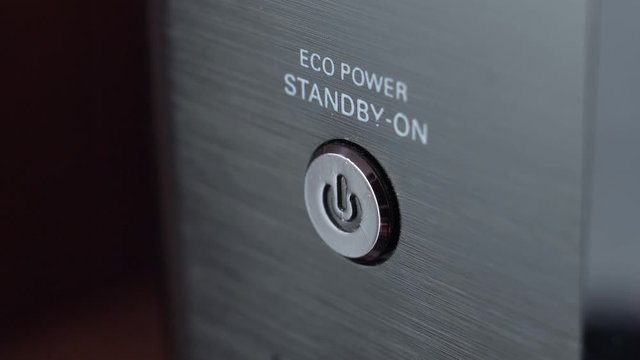 Pressing Stand By Power Button Close-Up