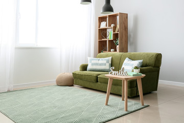 Interior of modern room with comfortable sofa