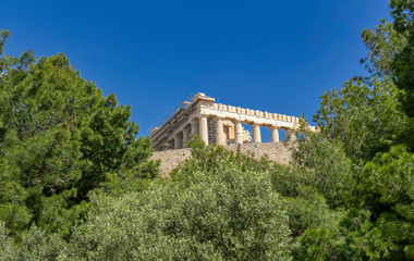 Fototapeta na wymiar partial view of Parthenon temple on Acropolis of Athens under clear blue sky , Greece