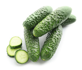 Fresh green cucumbers on white background