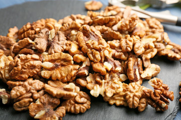 Tasty walnuts on table, closeup