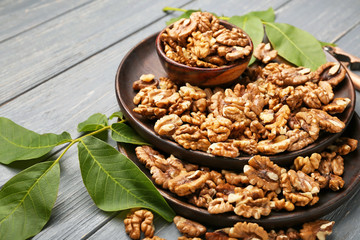 Composition with tasty walnuts on wooden background