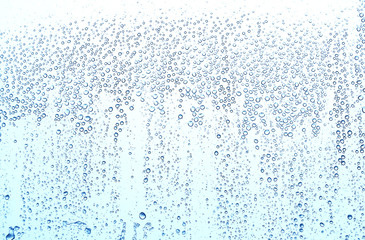 Naklejka na ściany i meble Raindrops on window glass