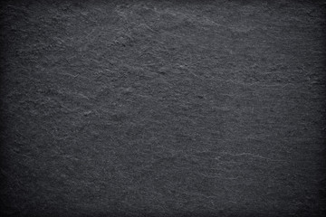 Dark grey black slate background or texture.