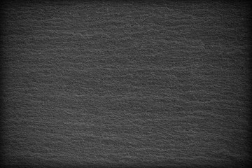 Dark grey black slate background or texture.