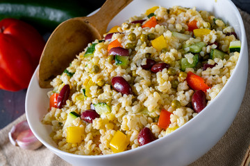 bulgur kaszotto with fresh vegetables and kidney bean