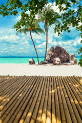 Tropical beach with bamboo deck