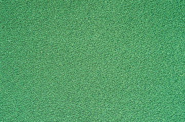 Fototapeta premium Fragment of a light green fabric, for fabrics of dresses and suits.