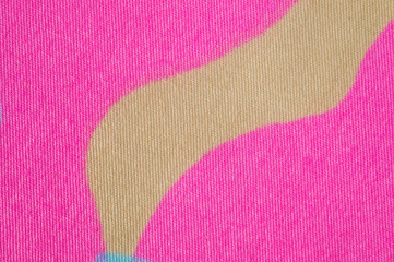 Tight cotton with a bright summer print, photographed close-up.