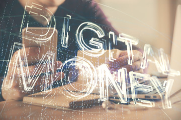 Double exposure of man's hands holding and using a phone and crypto currency blockchain theme drawing.