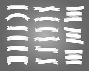 Set of white ribbon and banner on black background. Flat vector design.