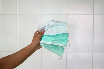 surgical mask in clinic. discarded mask. The mask that was discarded after the virus spread.