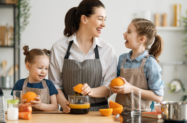 Happy family in the kitchen.