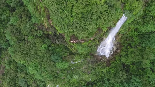A surprising snapshot of the drone in the fall in Salalah, Ain Darbat, Sultanate of Oman