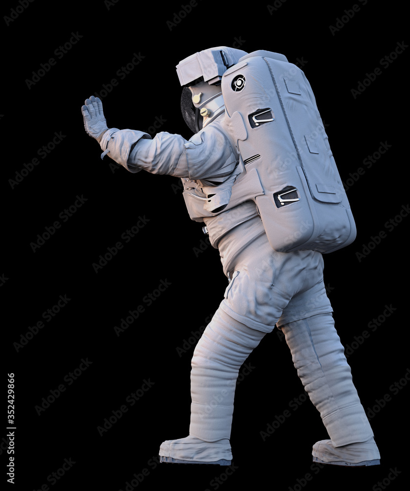 Wall mural astronaut pushing an empty space isolated on black background