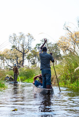 Boat trip in a traditional Makoro at the Okavango Delta, Botswana