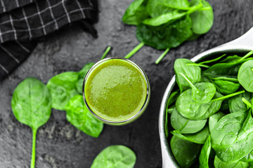 Homemade spinach smoothie (close up; selective focus)