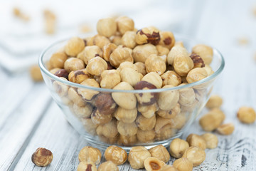 Peeled Hazelnuts (close up shot; selective focus)