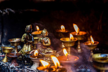 Burning Yak Butter Lamps in Nepal