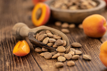 Shelled Apricot Kernels (close up shot; selective focus)