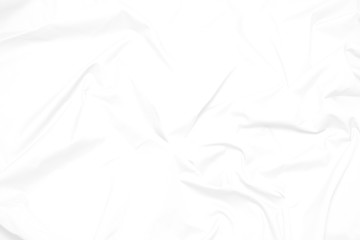 White  fabric cloth background abstract with soft waves , flowing draped cloth in rippled elegant curves and wrinkled creases , soft focus, textured background and abstract