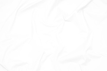 White  fabric cloth background abstract with soft waves , flowing draped cloth in rippled elegant curves and wrinkled creases , soft focus, textured background and abstract