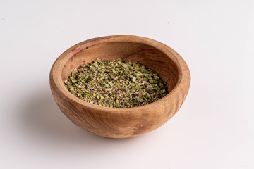 herbs in wooden bowl