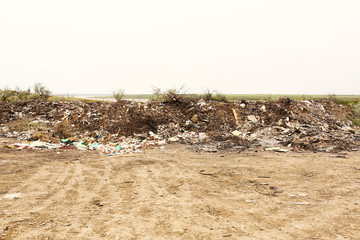 View of landfill outdoors. Concept of soil pollution