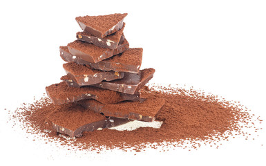 Milk chocolate with nuts and crushed cocoa isolated on a white background
