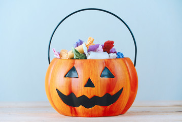 The candy that the children received as a gift put in a pumpkin-shaped basket which had a cool...