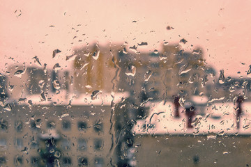 Fototapeta na wymiar Raindrops on window pane