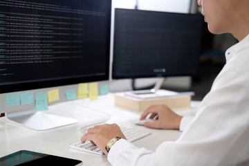 Programmer is coding and programming software
