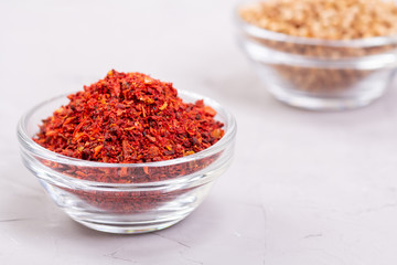 Moroccan spice Harissa and coriander in a glass plates