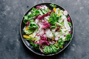 Mix healthy salad romaine,chard,radicchio with radish.
