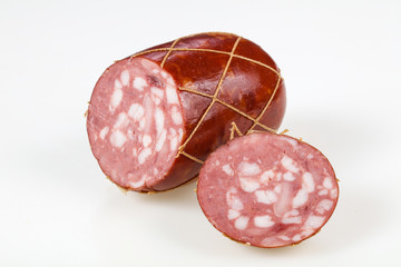 Tasty meat sausages over white background