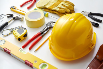 repair, building and renovation concept - different work tools on white background