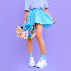 Fresh flowers Summer look. .Girl in short playful skirt.  Bloom romantic vibes. Blue monochrome...