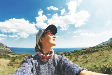 Smiling woman selfie.