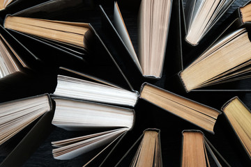 Naklejka premium Old books, top view on the binding
