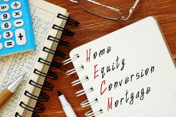 Fototapeta premium Home Equity Conversion Mortgage HECM phrase on the piece of paper.
